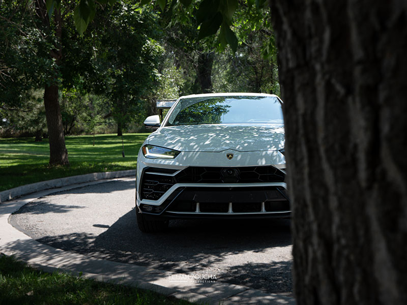 White Lamborghini Urus parked in park