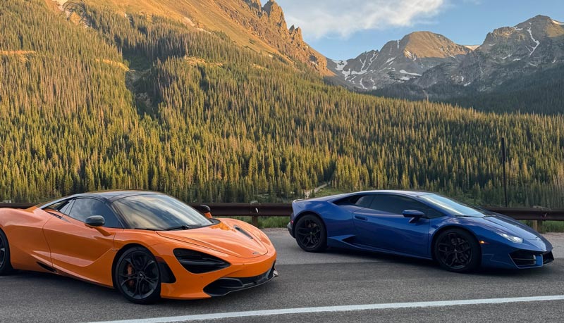 Orange McLaren 720s and blue Lamborghini Huracan Coupe side view