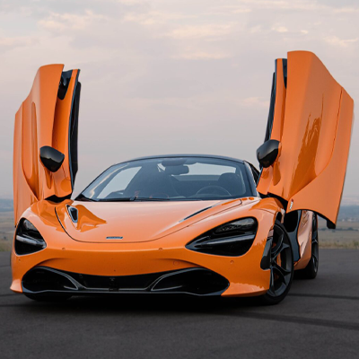 Orange McLaren 720s doors open